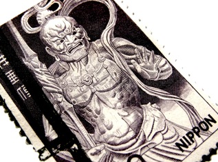 Featured is a macro photo of a Japanese stamp.